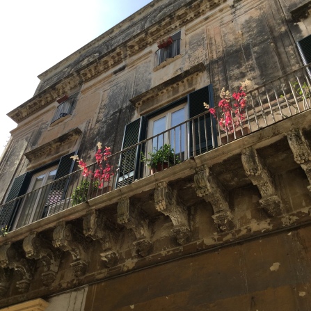 Lecce building with ornate balcony
