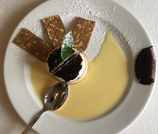 A divine desert based on olives: olive paste (sweetened), olive oil mousse. The almond biscuits were buttery and crisp. The creme anglaise added enough sweetness.